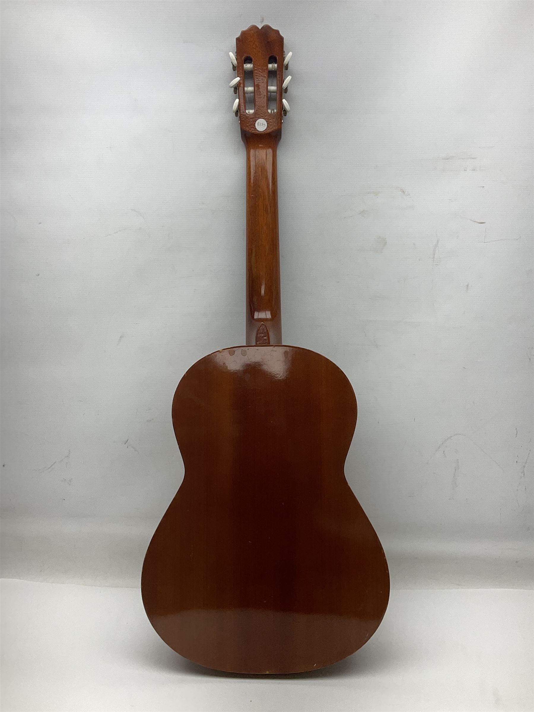 Spanish BM acoustic guitar with mahogany back and sides and spruce top L101cm; in cello carrying case; Roland foot pedal and two Yamaha foot pedals; tin D# organ pipe; folding music stand etc