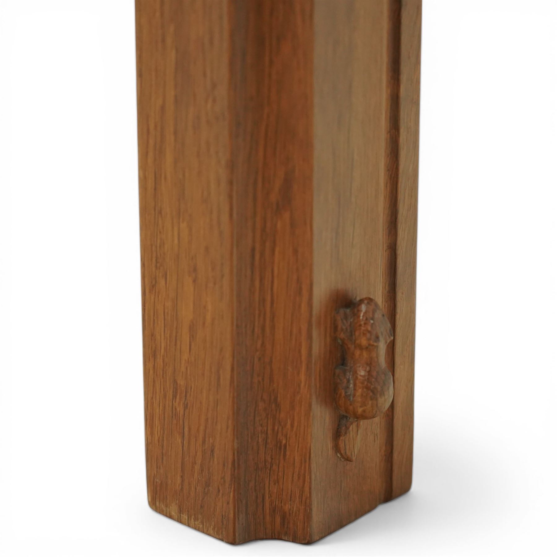 Beaverman - oak fire surround, moulded edge surrounding a rectangular aperture, with carved beaver signature, by Colin Almack of Sutton near Thirsk