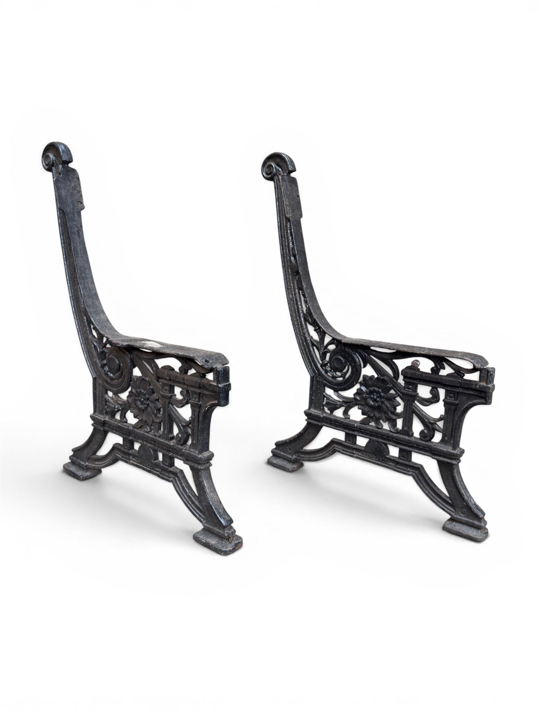 Yates Haywood - pair of Victorian cast iron bench ends, Architectural scrolling design with flower head detail, stamped with period registration number and date