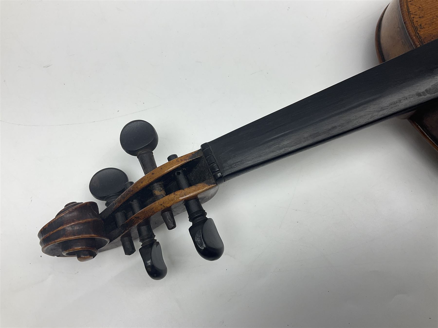 Late 19th century German trade violin c1890 with 36cm two-piece birds-eye maple back, neck and ribs and spruce top; bears label 'Manufactured in Berlin Special Copy of Nicolaus Amati' L59.5cm; in carrying case