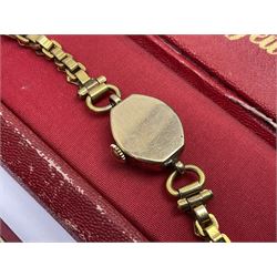 Ladies Accurist 9ct gold manual wind wristwatch, on gilt metal bracelet, together with a silver and enamel fob, for the Transport and General Workers Union, with personal engraving to reverse, hallmarked, a safe driving medal and a Quartz wristwatch