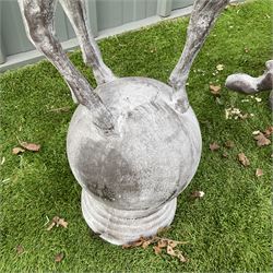 A pair of cast iron garden stag finials on ball bases - THIS LOT IS TO BE COLLECTED BY APPOINTMENT FROM DUGGLEBY STORAGE, GREAT HILL, EASTFIELD, SCARBOROUGH, YO11 3TX