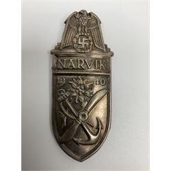 Two German Arm-Shield badges - one Russian Front marked Demjansk 1942; the other marked Narvik 1940 (2)