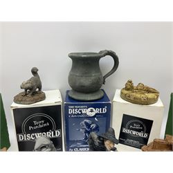 Terry Pratchett Discworld figures, comprising Roderick the hippo, DWE2, a 1995 event piece, Rincewind bookend, DW11, Death bookend, DW12, Librarians wizard knob, boxed, DW55, the luggage, boxed, DW04, tankard from the mended drum, DW21, Teppic the assassin, DW32, Greebo, DW45, Herne the hunted, DW64, Gaspode,  DW31, Quoth on skull, DW49 and Dibbler's compass DW16. 