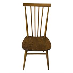 Ercol - pair of mid-20th century highback 'Windsor' chairs, curved top rail over six vertical spindles and shaped seat, on tapering cylindrical supports with stretchers