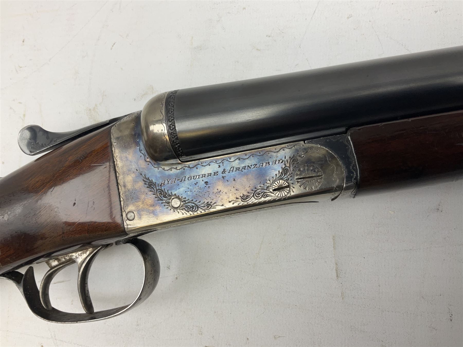 Spanish AYA 12-bore double barrel side-by-side boxlock ejector sporting gun, with 66cm barrels and top safety, walnut stock with chequered grip and fore-end, serial no.157943 L111cm SHOTGUN CERTIFICATE REQUIRED