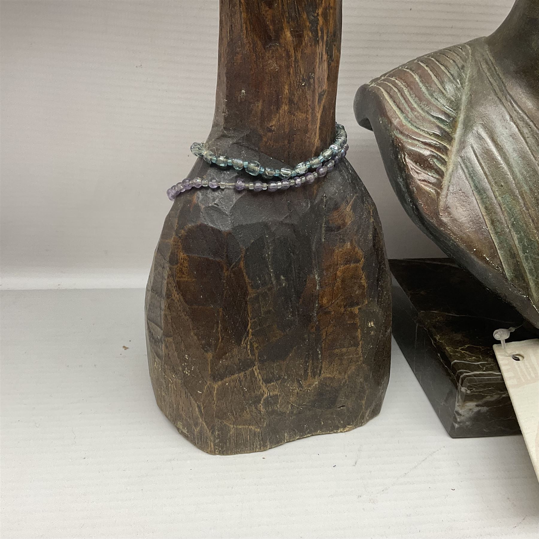 Bronzed bust of Greek man upon a marble base, together with two wooden sculptures 