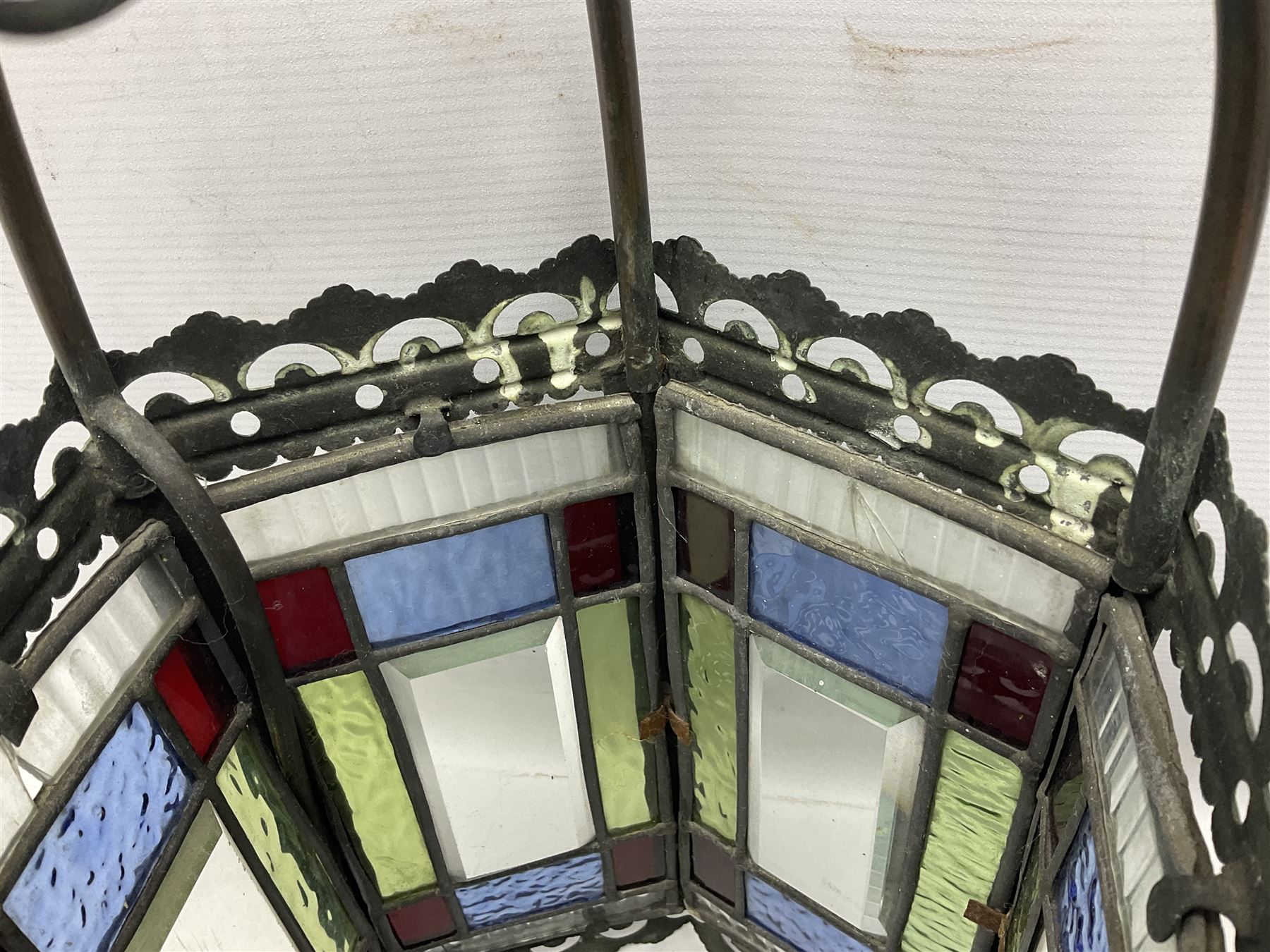 Victorian brass and stained leaded glass hall lantern, of hexagonal form, supported by four domed arms and pierced fret, H46cm W20cm
