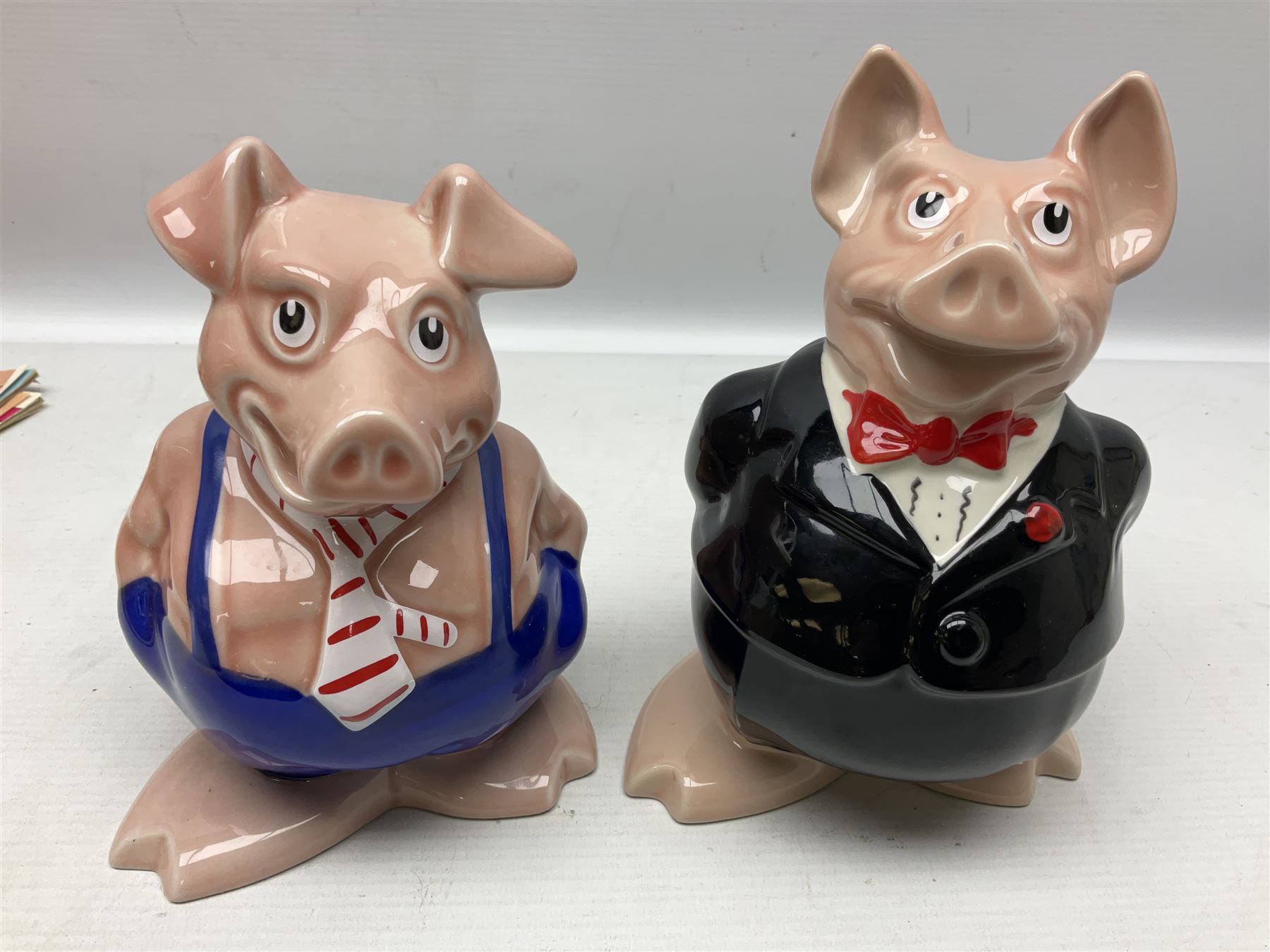 Set of five Wade NatWest money boxes, comprising father, mother, boy, girl and baby, four with original boxes 