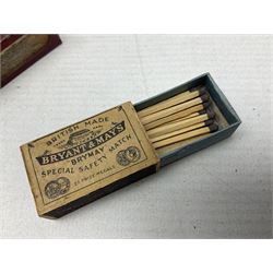 Victorian leather cigar protector with metal match striking plate on the end and internal spring to hold the cigars in place; expands for differing lengths of cigar, minimum L12.5cm; another similar leather cigar case marked Middlemore's Patent with attached vesta case and striker; three Bryant & Mays tin-late matchbox holders including 1935 Jubilee; and small box of matches (6)
