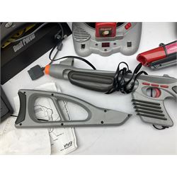 Mad Catz Dual Force Racing Wheel and Foot control for Playstation; Arcadia Image Projecting Game System; pair of Captain Scarlet and the Misterons phaser guns etc