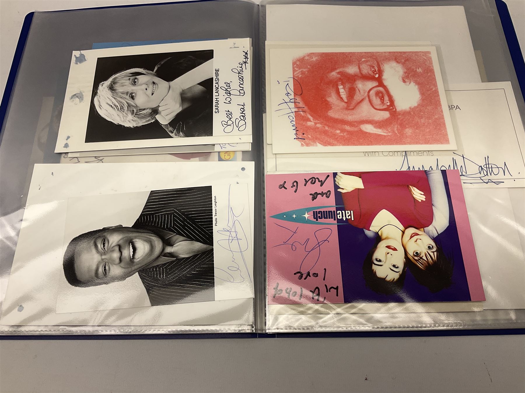 Two folders of over fifty photographs, cards, compliment slips etc of actors, actresses, celebrities, politicians, sports personalities etc, all bearing signatures, including David Frost, Lloyd Grosman, John Suchet, Julia Somerville and othe GMTV presenters, Carol Vorderman, Jackie Collins, Rolf Harris, Timothy Dalton, Pete Postlethwaite, Magnus magnusson, John Major, Kate Moss, Uri Geller, David Beckham, Peter Alliss, Sharon Davies, Kevin Keegan etc