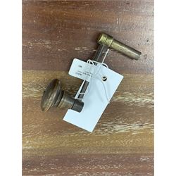 19th century carved oak longcase clock, projecting cornice over guilloche carved frieze, square brass dial with silvered Roman chapter ring and calendar aperture, decorated with ornate mask cast spandrels, the trunk door and base carved with potted plant, twin train driven eight day movement striking on bell