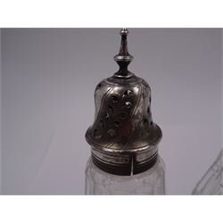 Late 18th century silver cruet stand, of oval form, with pierced sides upon four bun feet, hallmarked to handle Hester Bateman, all other hallmarks indistinct, together with five matched silver mounted cut glass cruet bottles, including some later Victorian examples, hallmarks predominantly indistinct, stand H20cm