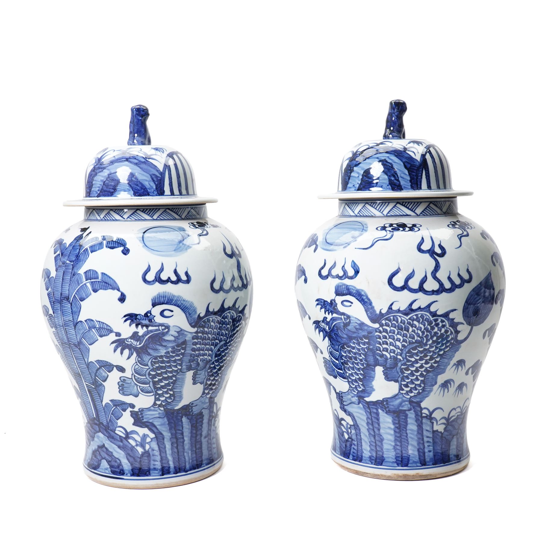 Pair of blue and white Chinese baluster vases and covers decorated with dragons, foliage etc H49cm