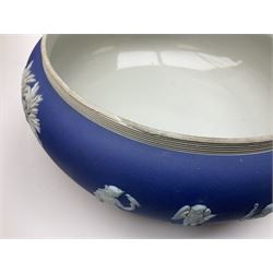 Two Royal Crown Derby pattern Imari soup bowls, pattern 2451, Belleek Fermanagh Ireland four piece set in green shamrock pattern, Royal Doulton small lady figure, Marie HN1370, large Wedgwood fruit bowl, Sylvac jardiniere in autumn leaves pattern, five pieces Co-operative Society commemorative ceramics, with selection of other ceramics. 