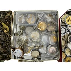 Large selection of dismantled clock wheels and pinions, watch movements, watch cases and spare parts, with an assortment of clock and other winding keys.