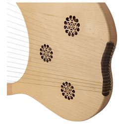 Contemporary - 16 string lyre harp with a beech and ash frame, steel strings and plated tuning pins, with decorative fretwork to the soundboard.