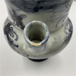Tin glazed earthenware wet drug jug, decorated with cherubs in a landscape, H90cm 