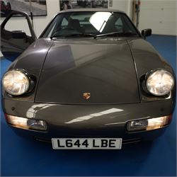 1991 Porsche 928 S4 Automatic Coupé

Registration: L644 LBE
Date of first registration as shown on V5: 1 July 1994
Porsche year of manufacture: 1991
Engine: 5.0-litre V8 petrol
Transmission: Automatic
Odometer reading: 37,886 kilometres (approximately 23,541 miles)
Colour: Slate Grey metallic
Interior: Black leather
V5C: Present
Keys: One
Chassis number: WP0ZZZ92ZMS800460

An exceptional Porsche 928 S4 Automatic Coupé finished in Slate Grey metallic with a black leather interior. The car displays a notably low odometer reading of just 37,886 kilometres, equivalent to approximately 23,541 miles.

The 928 S4 combined Porsche’s powerful 5.0-litre V8 engine with a sophisticated rear-mounted transaxle, creating a refined and accomplished grand tourer. This example is equipped with automatic transmission, electrically adjustable front seats, air conditioning, alloy wheels and the characteristic rear spoiler.

The car was purchased from Specialist Cars of Malton in June 2019, at which time the recorded mileage was 36,650 kilometres. The accompanying service record includes evidence of a cam belt replacement.

Presented in excellent condition throughout, the bodywork and metallic paint finish appear particularly well preserved, while the cabin retains its original character with black leather upholstery and 928-branded sill trims. A Japanese Porsche service label records maintenance entries at 31,902, 33,397 and 34,134 kilometres.

The car also features a Porsche Classic Communications Management (PCCM) upgrade system.

Features

• 5.0-litre V8 petrol engine
• Automatic transmission
• Slate Grey metallic paintwork
• Black leather interior
• Electrically adjustable front seats
• Air conditioning
• Porsche alloy wheels
• Rear spoiler
• Right-hand drive
• Odometer reading of 37,886 kilometres, approximately 23,541 miles
• Purchased from Specialist Cars of Malton in June 2019
• Recorded at 36,650 kilometres when purchased
• Service record showing cam belt replacement
• Japanese Porsche service label
• V5C present
• One key

This vehicle forms part of the Estate of the Late John Sils and is offered for sale by the Executors, confirming a genuine reason for sale.