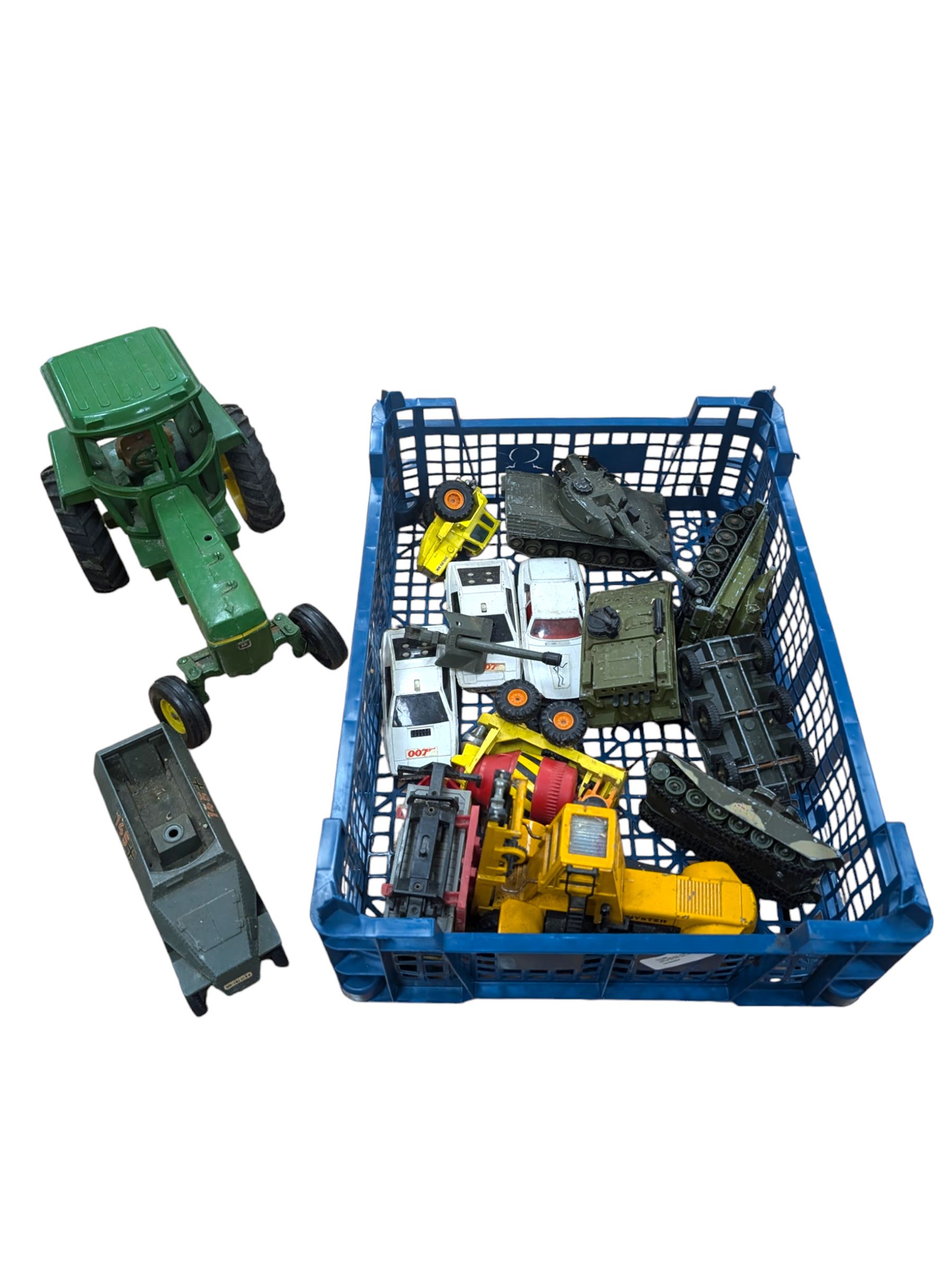 Diecast vehicles, including Britains John Deere tractor, two Corgi 007 Lotus Espirit, four Dinky tanks, etc