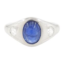 Platinum sapphire and diamond three stone ring, single cabochon sapphire of 1.65 carat, wi...