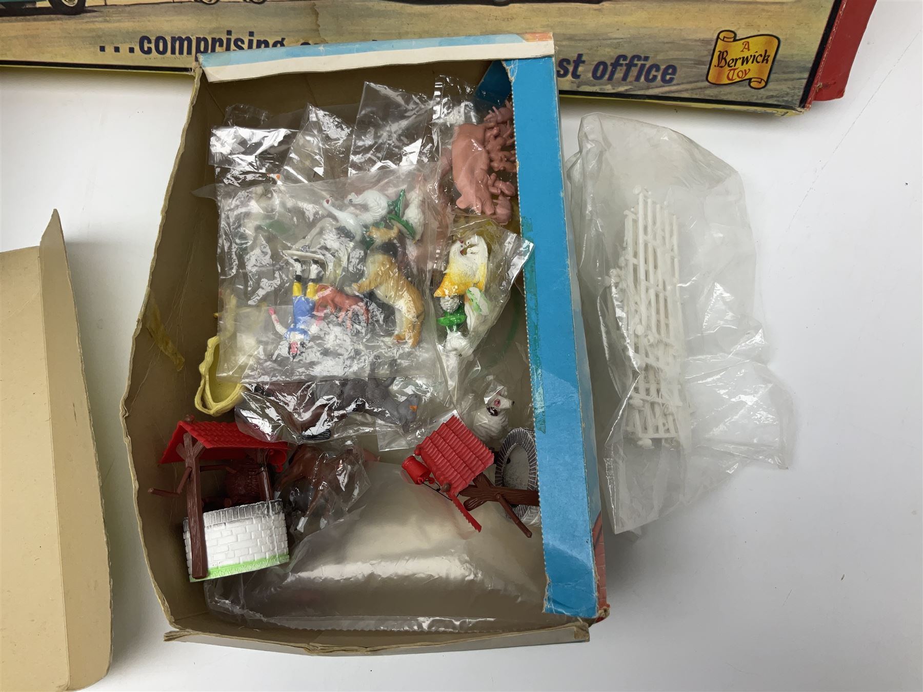 Berwick Toys High Street Shops layout with well-stocked sweet shop and post office; H.C.F. Build A Farm set; and Jukepet battery operated miniature jukebox; all boxed (3)