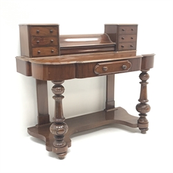  Victorian mahogany Duchess dressing table, raised back, six drawers flanking central compartment with hinged lid above single frieze drawers, turned supports joined by shaped stretcher tier, W121cm, H100cm, D56cm  