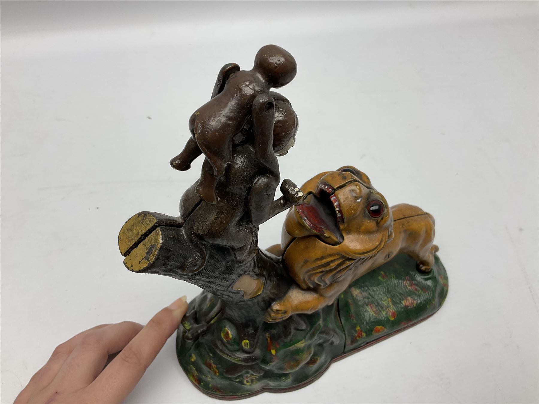 Late 19th century cast-iron mechanical money bank 'Lion and Two Monkeys' by Kyser & Rex with impressed patent mark for 17th July 1883 H25cm L23.5cm