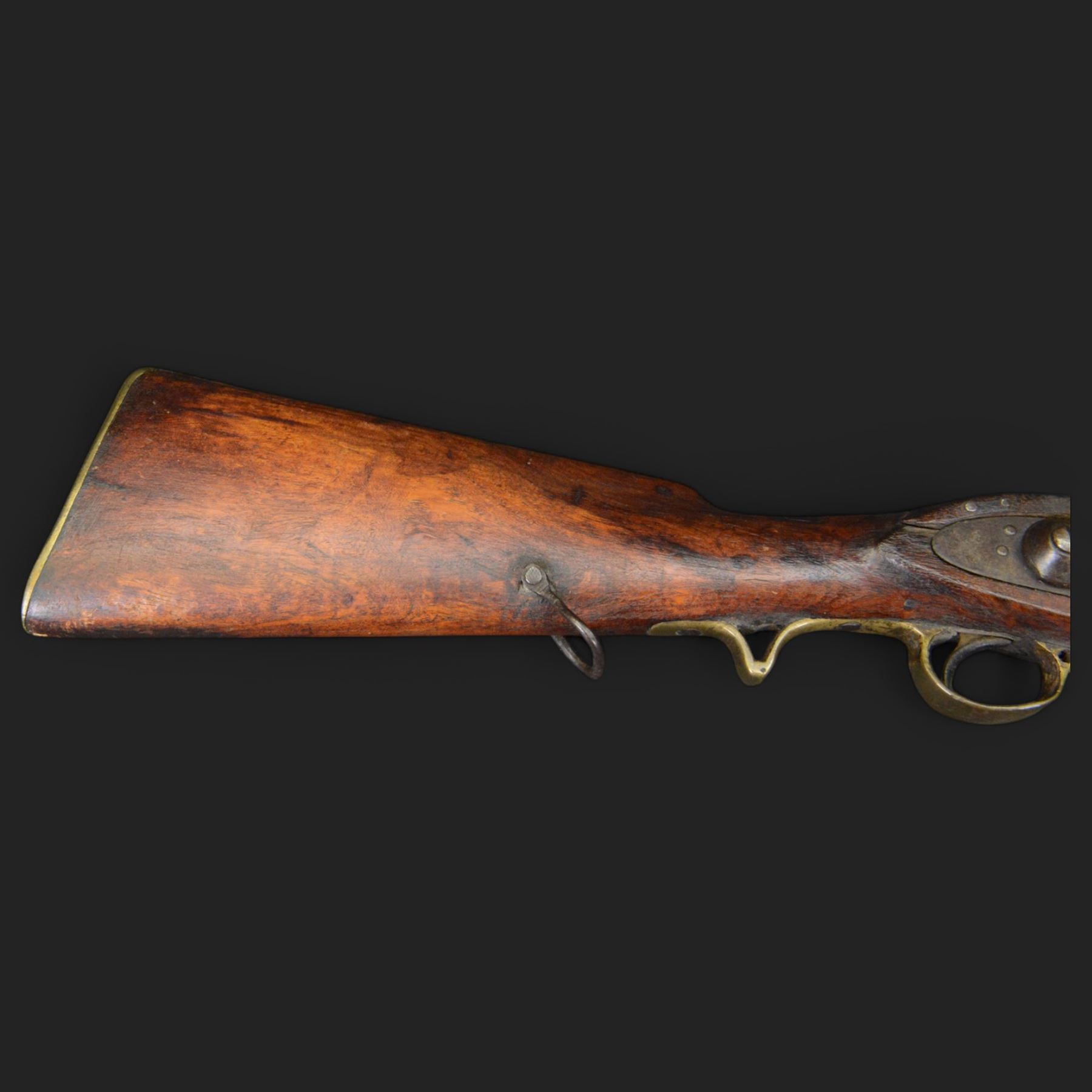 Percussion musket, the 70cm barrel with ramrod under, full walnut stock, with two sling swivels, overall L110cm
Sold as an exempt item under Section 58 (2) of the 1968 Firearms Act, to be held as a curiosity or ornament