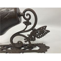 Cast iron exterior hanging garden bell with decorative butterfly bracket