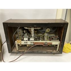 Three mid 20th century radios comprising 1950s Grundig wood cased valve radio model 3028/GB, together with a 1970s Grundig Type RF 153 CS 150 radio in teak case, and an Ekco 355 1960's valve radio, largest W60 H35cm D23cm