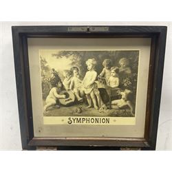Late 19th century Symphonion disc musical box for spares or repair, inlaid walnut case with front lever action, playing 25.5cm discs on a 10.5cm steel comb with forty-nine teeth, musical scene of cherubs under the lid, L33cm; together with twelve 25.5cm discs