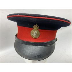 Royal Military College Sandhurst parade uniform with peaked cap and two-piece mess dress, all bearing historic manuscript labels for J.E.A. Baldwin, possibly Air Marshal Sir John Eustace Arthur Baldwin (1892-1975) who served in the British Army 1910-18 & 1944-58 and in the RAF 1918-44.