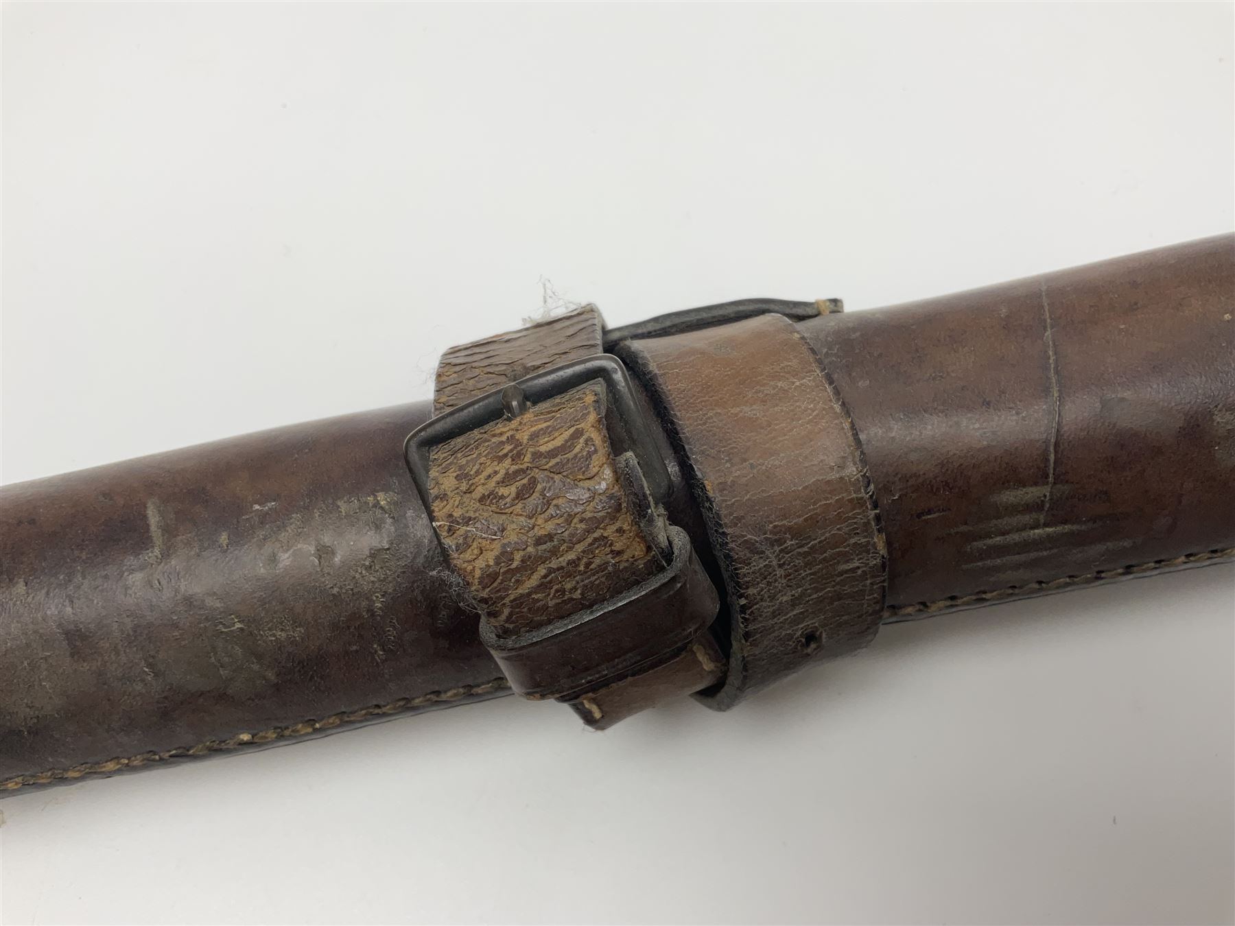 19th century telescopic hunting horn, the bell engraved 'The Beaufort', with makers mark Kohler & Son, makers, 61 Victoria Street, Westminster (from Covent garden) London, in a leather sheath, horn full extended L91cm 
