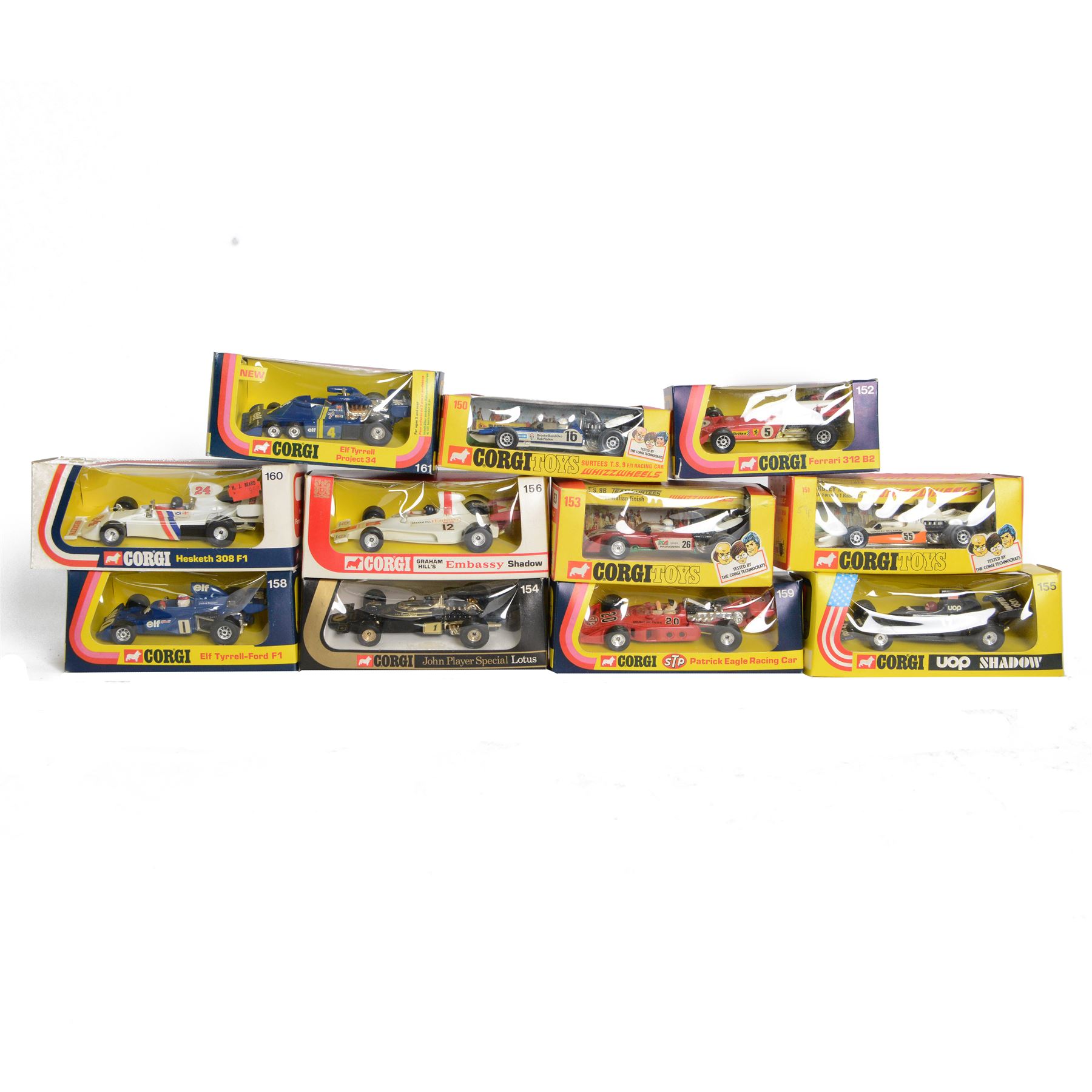 Eleven Corgi diecast Formula 1 models, comprising 152 Ferrari 312 B2, 161 Elf Tyrell Project 34, 158 Ef Tyrell Ford, 151 Whizzwheels Yardley McLaren M19A, 154 John Player Special Lotus, 156 Graham Hill's Embassy Shadow, 153 Whizzwheels TS9B Team Surtees, 155 UOP Shadow, 159 Patrick Eagle Indianapolis, 160 Hesketh 308 and 150 Whizzwheels Surtees TS9
