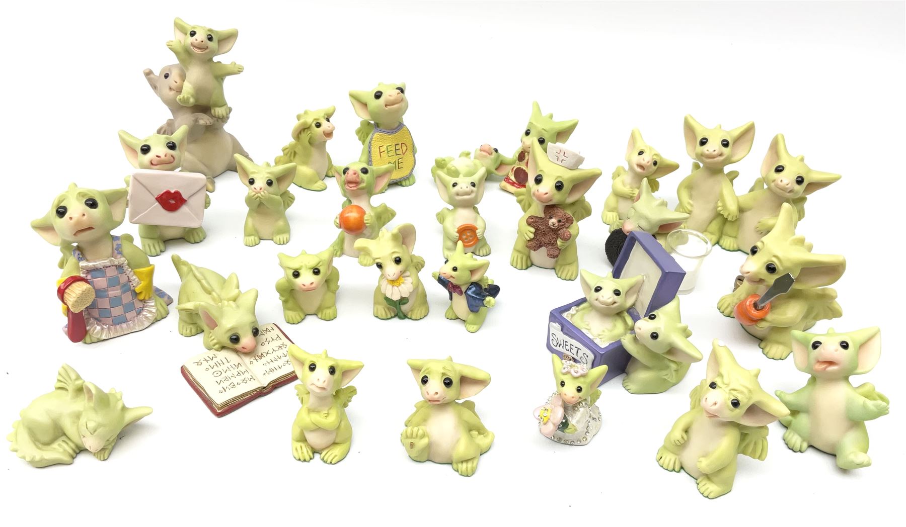 A collection of Real Musgrave Pocket Dragons figures, (all boxed except one example).