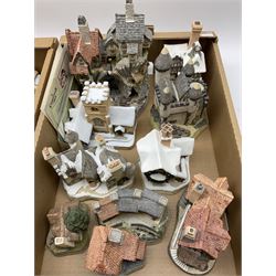 A collection of boxed David Winter cottages, of various size and form, to include Wreckers Cottage, Scottish Collection Macbeth's Castle, Special for Christmas 1988 Christmas in Scotland and Hogmanay, Special for Christmas 1990 Mister Fezziwig's Emporium, The Scrooge Family Home, Special for Christmas 1989 A Christmas Carol, The Midlands Collection Miners Row, Will-o-the wisp, etc., together with a plaque titled On the Riverbank, a number of examples with accompanying certificates. (30).