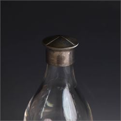 Mid 20th century silver travelling communion set, comprising goblet, paten and pyx, all hallmarked Hurst, Franklin & Co Ltd, London 1961 & 1962, with a glass bottle with unmarked cover, all within a tooled leather fitted case, goblet H9cm