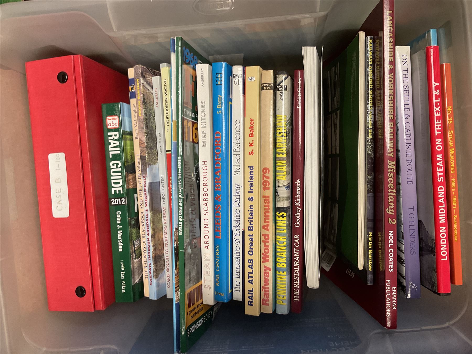 Collection of various train related books, ephemera and paraphernalia, to include various photographs, slides, the Lancaster & Yorkshire Railway Magazine, Rail Guides etc, in four boxes 