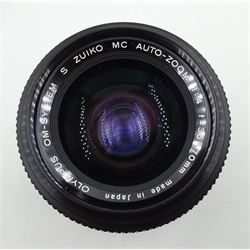 Olympus OM-10 SLR Camera with Olympus neck strap, Olympus OM-System S Zuiko Auto-Zoom 35-70mm 1:4 Lens, Kiron Macro 80-200mm 1:4 Lens in Kiron Protective Case, Ring 282 Twin Flash. 