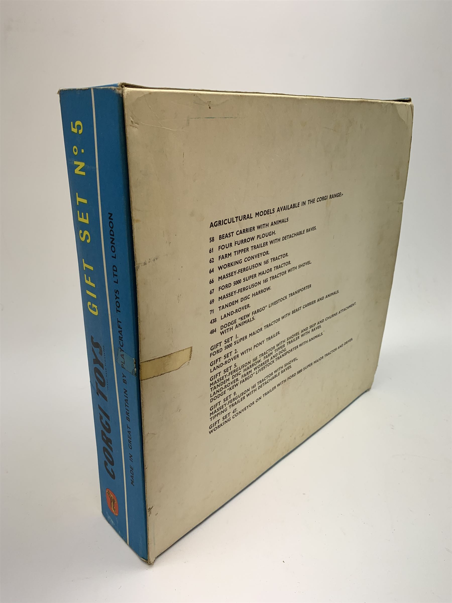 Corgi Toys Agricultural Gift Set No.5 containing Massey-Ferguson 165 Tractor with shovel and skip and churns attachment with two churns, Tandem disc harrow, farm tipper trailer with raves, Land Rover, Dodge Kew Fargo truck with four cattle and four pigs, farm worker and dog,  eleven large sacks and five small sacks, boxed