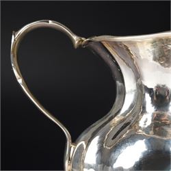 Italian 800 standard planished silver water jug of panel sided design with scroll handle  H14.5cm retailers label Bello di Frison, Padova