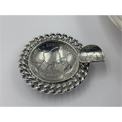 Spanish silver coin dish, with white metal chain rim and upon three ball feet, together with a silver plated armada style dish, with cast racehorse and jockey to centre, coin dish D4.8cm, armada dish D20.5cm