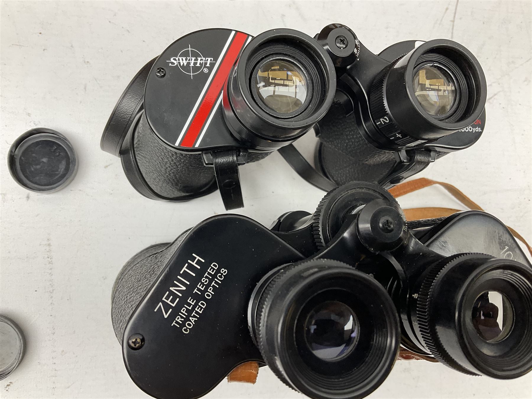 Nine cased pairs of binoculars, to include Embassy 8x40, Tasco 7x35, Zenith 10x50 Field. Opticron 10x50, Swift 8x40 Grand Prix Mk I, etc