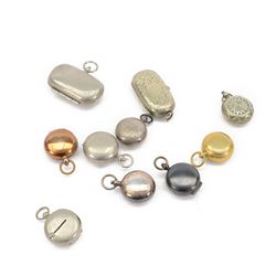 Ten sovereign holders, comprising two oval double sovereign holders and eight single sovereign holders, including brass, silver plate and gunmetal examples