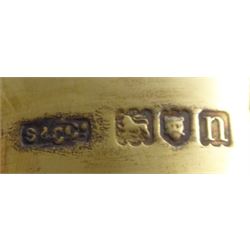 Edwardian silver-gilt twin handled trophy cup and cover, with two curved handles, the domed cover with urn finial, upon domed stepped foot and cylindrical mahogany base with applied plaque, hallmarked Skinner & Co, London 1908, total H29.7cm