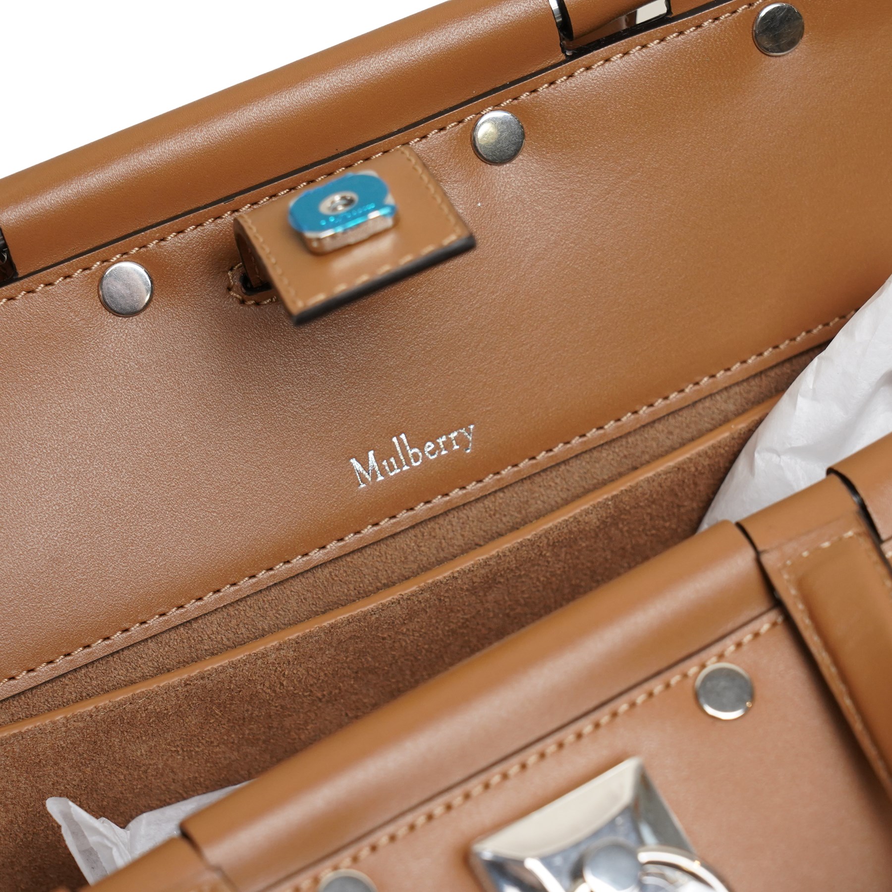 Mulberry - Iris Flat Stud handbag in Teak leather, the structured body with twin top handles and removable shoulder strap, polished silver-tone flat stud detailing and central ring hardware, opening with rolled top bars, with original Mulberry product tag, care booklet and dust bag, unused