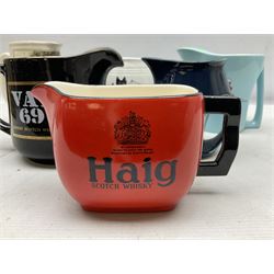 Six whisky water jugs, to include Wade Johnnie Walker, Haig, Black & White, etc