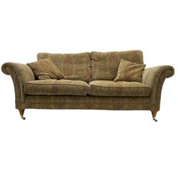 Parker Knoll two seat sofa, upholstered in natural beige patterned fabric